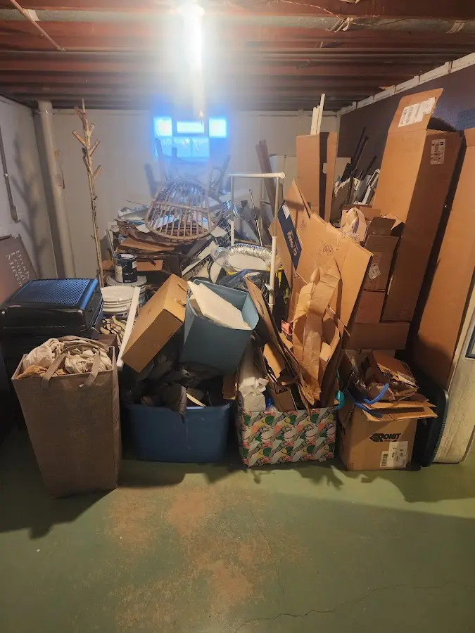 Roll-off dumpster container at job site for 20 Yard Dumpster Rental in Navy